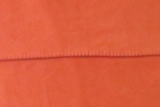 Farbmuster orange unserer Fleecedecke zum sticken oder lasern.